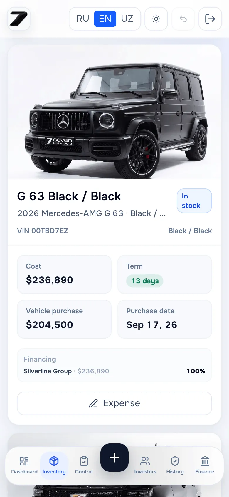 A car’s photo card on the phone: status, VIN, cost, days in stock, purchase date, financing split and an add-expense action.